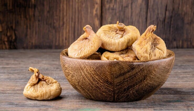 dried-figs-turkey-bowl-wooder-background-ai-generated_463801-4702 (1)