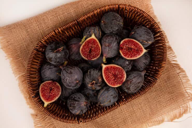 top-view-healthy-black-mission-figs-bucket-sack-cloth-white-background_141793-84427 (1)